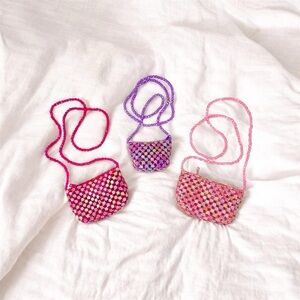 HANDMADE FLORAL BEADED MINI PURSES.
